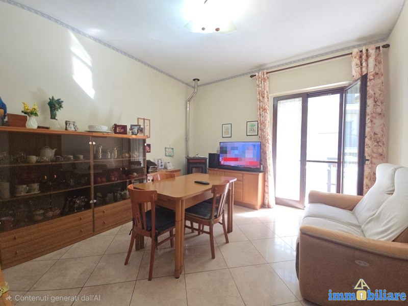 Abitazione con giardino e garage